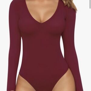 Burgundy long sleeve fitted bodysuit with plunge v-neckline